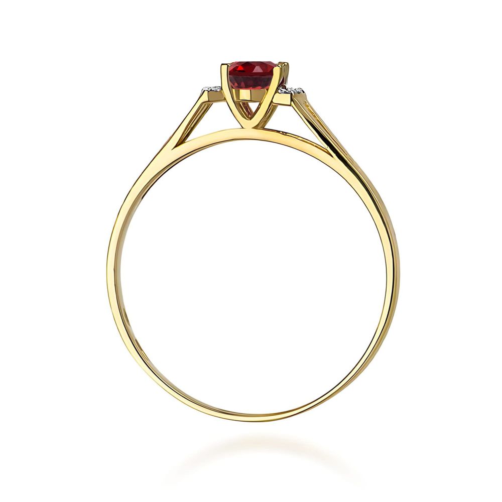 Pierścionek z granatem 0,50 ct i brylantami, żółte złoto 585