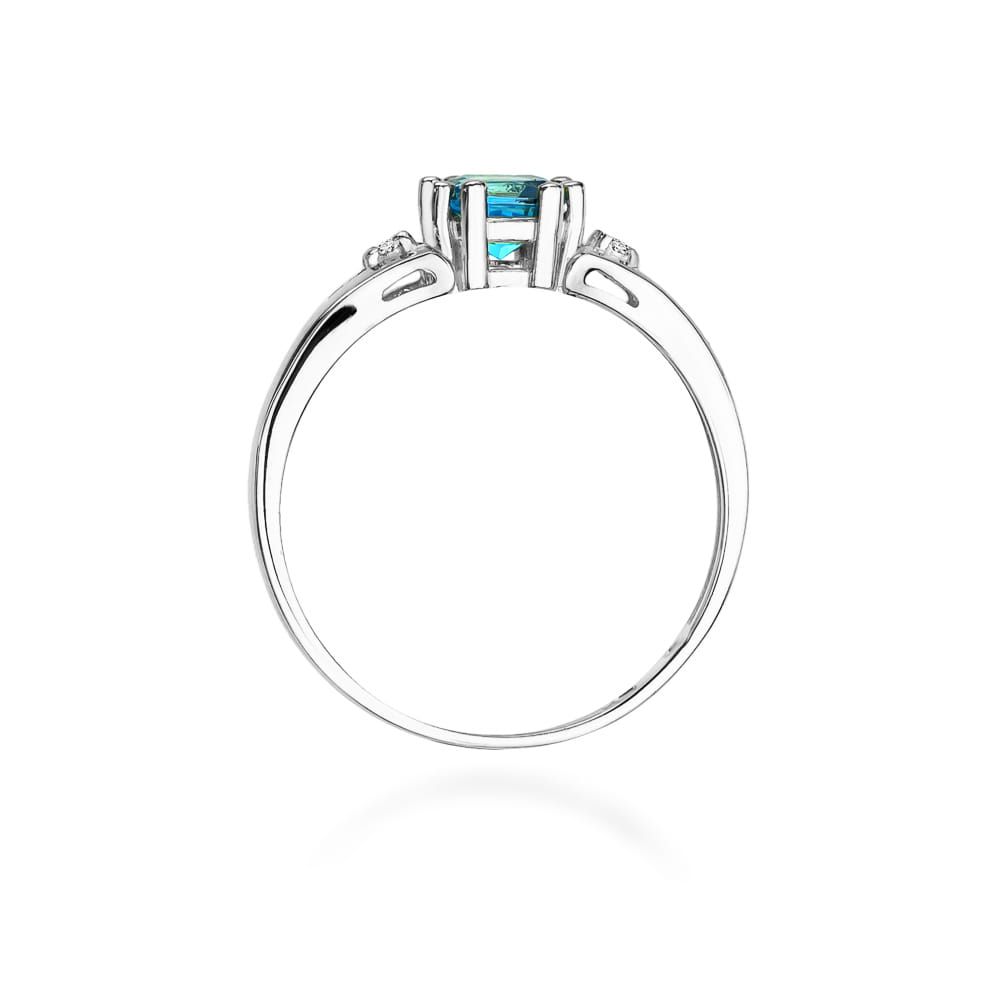 Pierścionek z topazem Swiss Blue 0,70 ct i brylantami, białe złoto 585