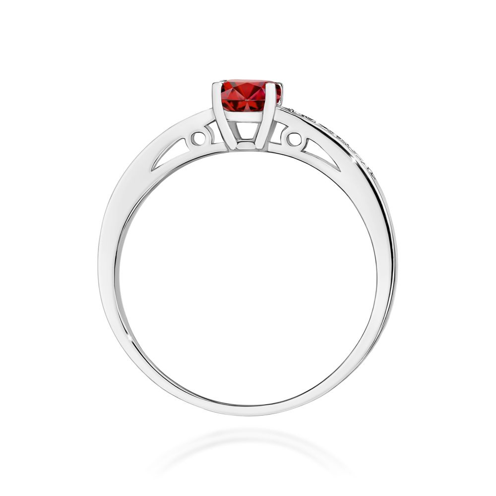 Pierścionek z granatem 0,60 ct i brylantami, białe złoto 585