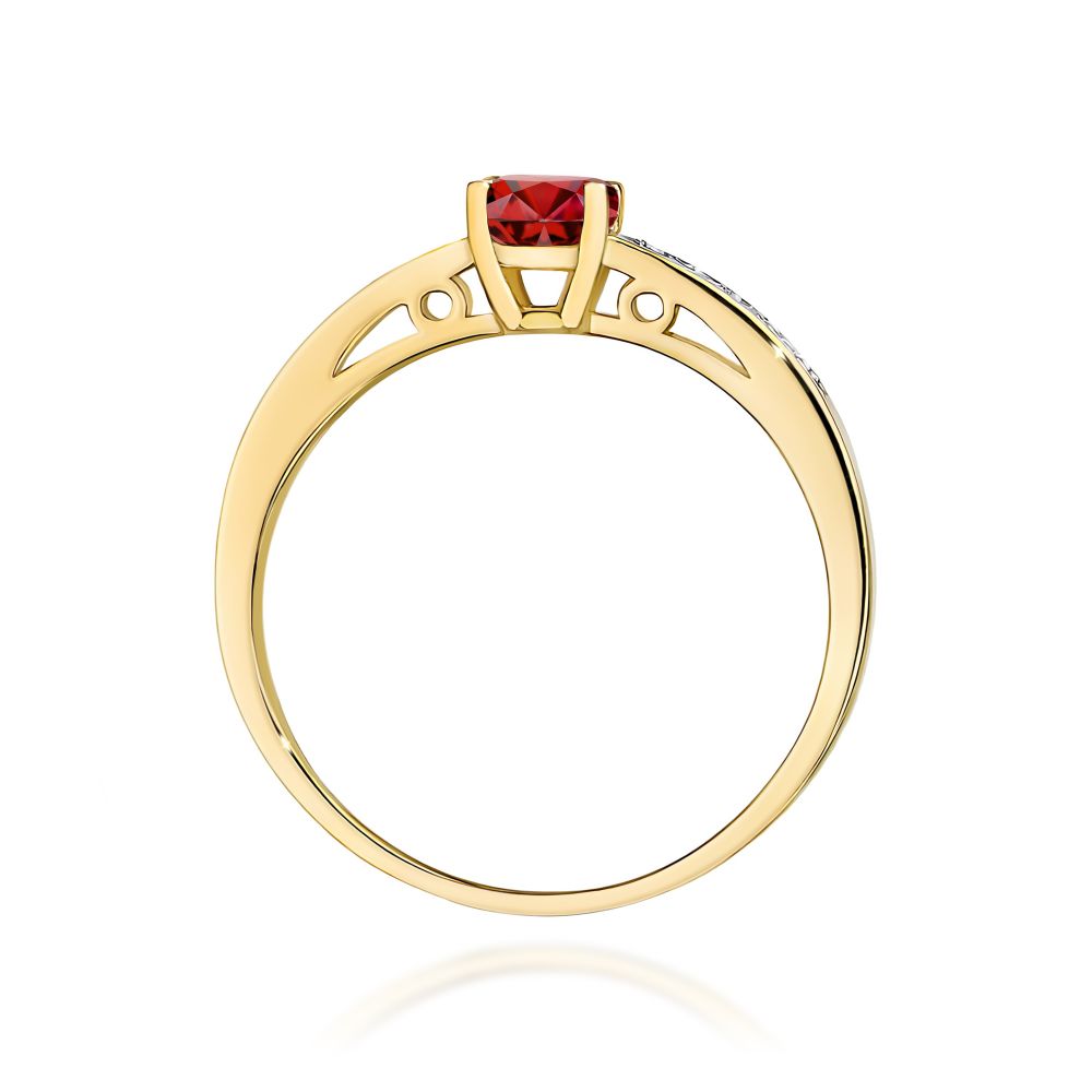 Pierścionek z granatem 0,60 ct i brylantami, żółte złoto 585