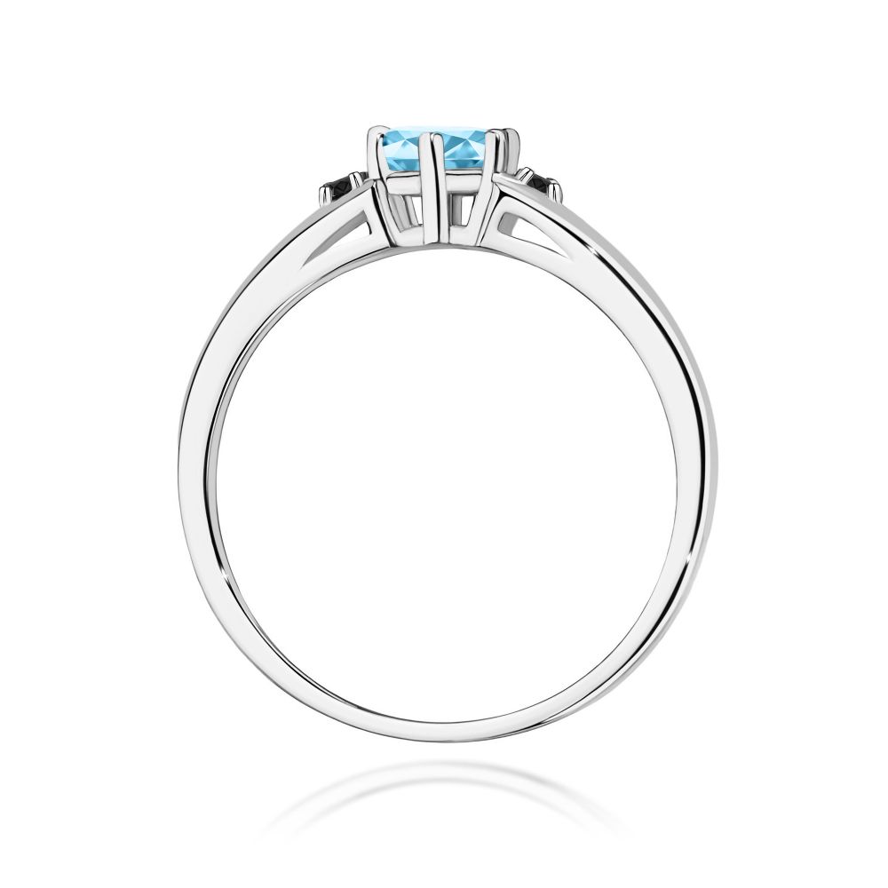 Pierścionek z topazem Swiss Blue 0,50 ct i czarnymi brylantami, białe złoto 585