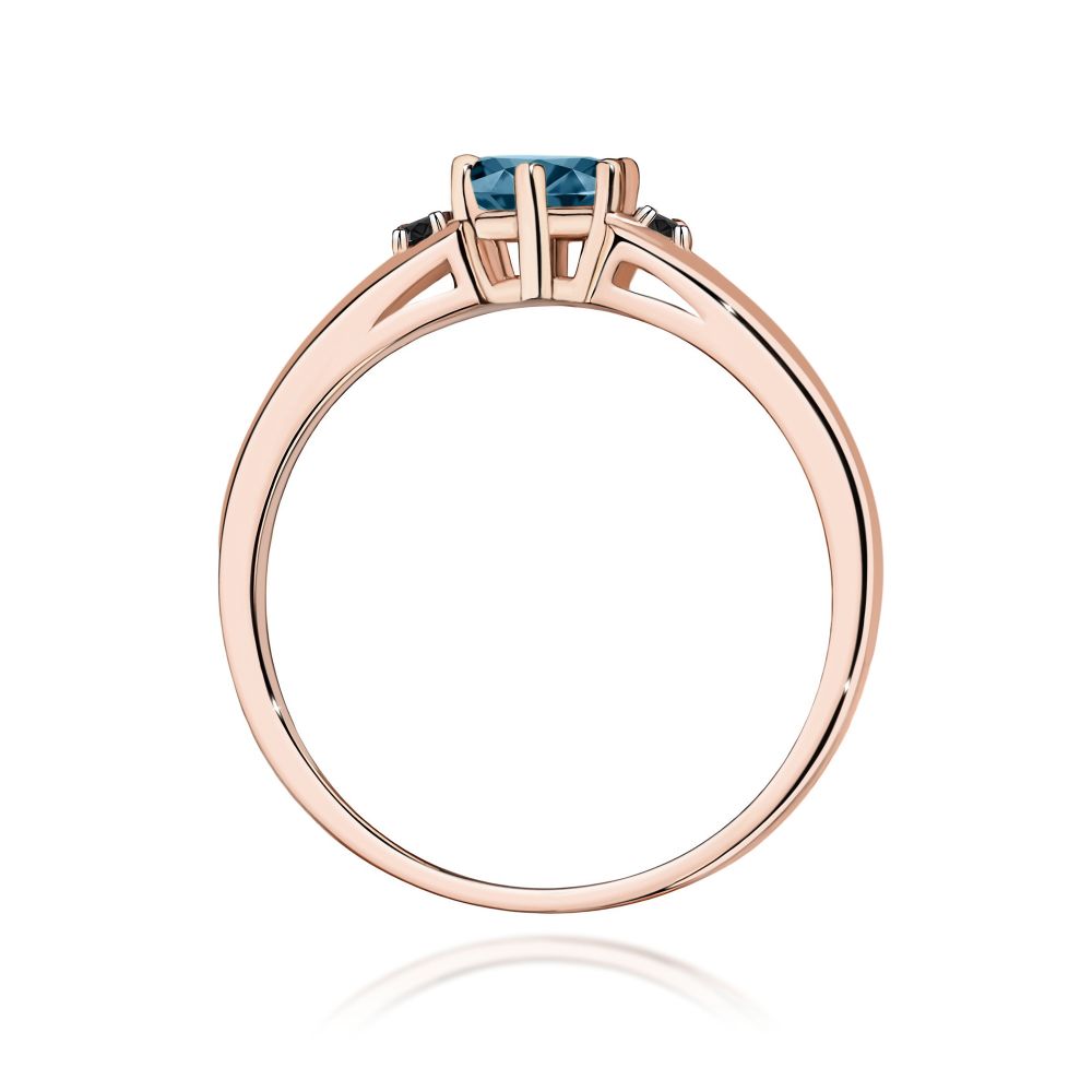 Pierścionek z topazem London Blue 0,50 ct i brylantami, różowe złoto 585