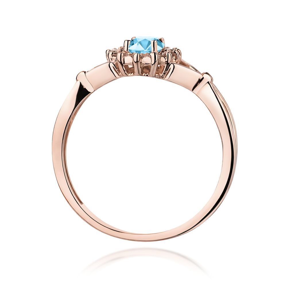Pierścionek z topazem Swiss Blue 0,50 ct i brylantami, różowe złoto 585