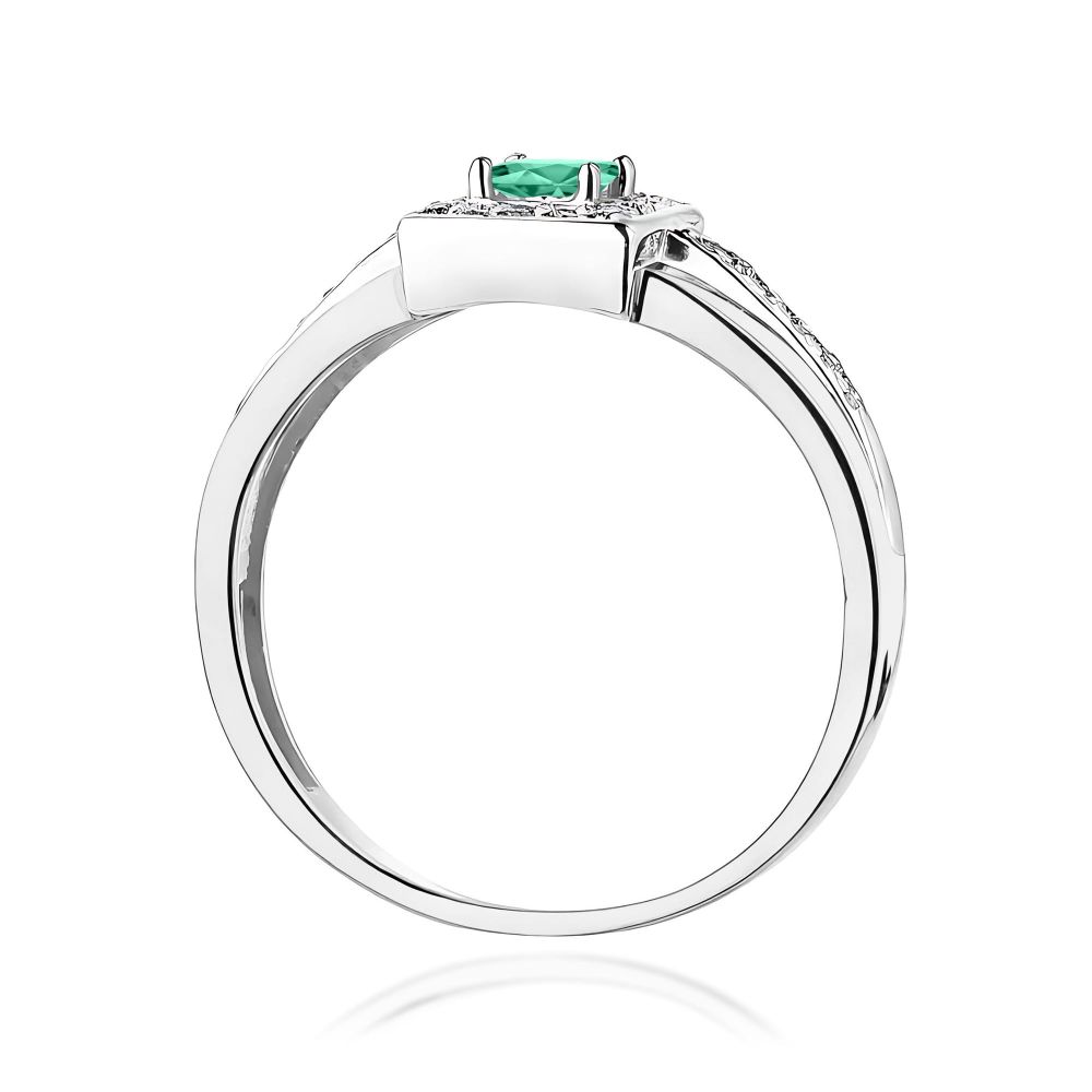 Pierścionek ze szmaragdem 0,15 ct i brylantami, białe złoto 585