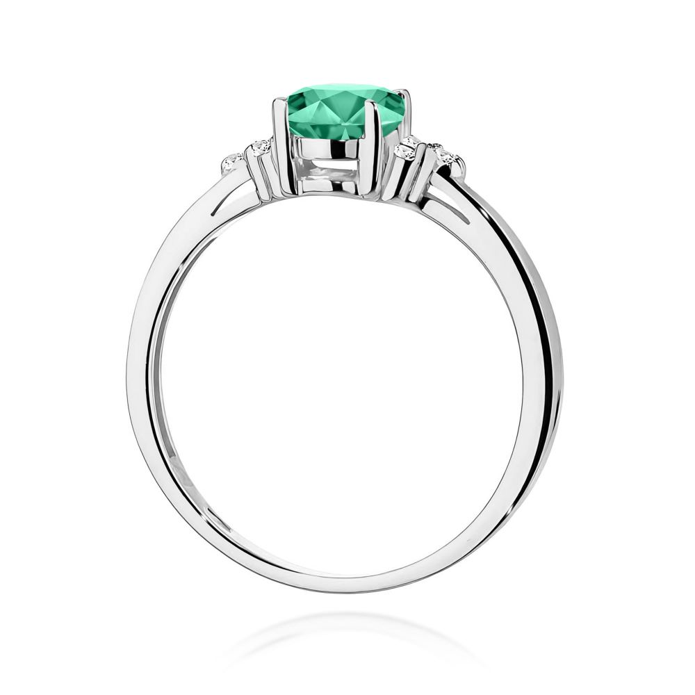 Pierścionek ze szmaragdem 0,80 ct i brylantami, białe złoto 585