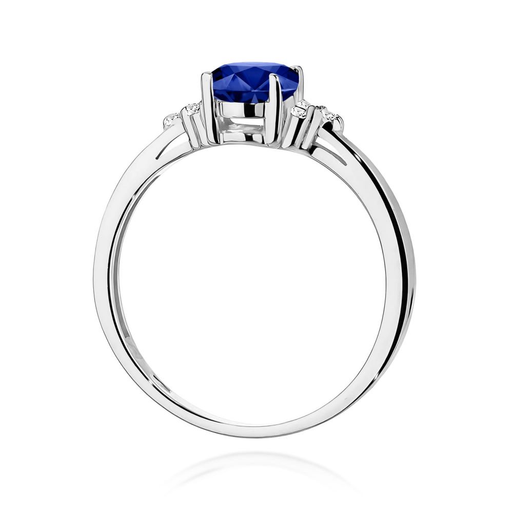 Pierścionek ze szafirem 0,90 ct i brylantami, białe złoto 585