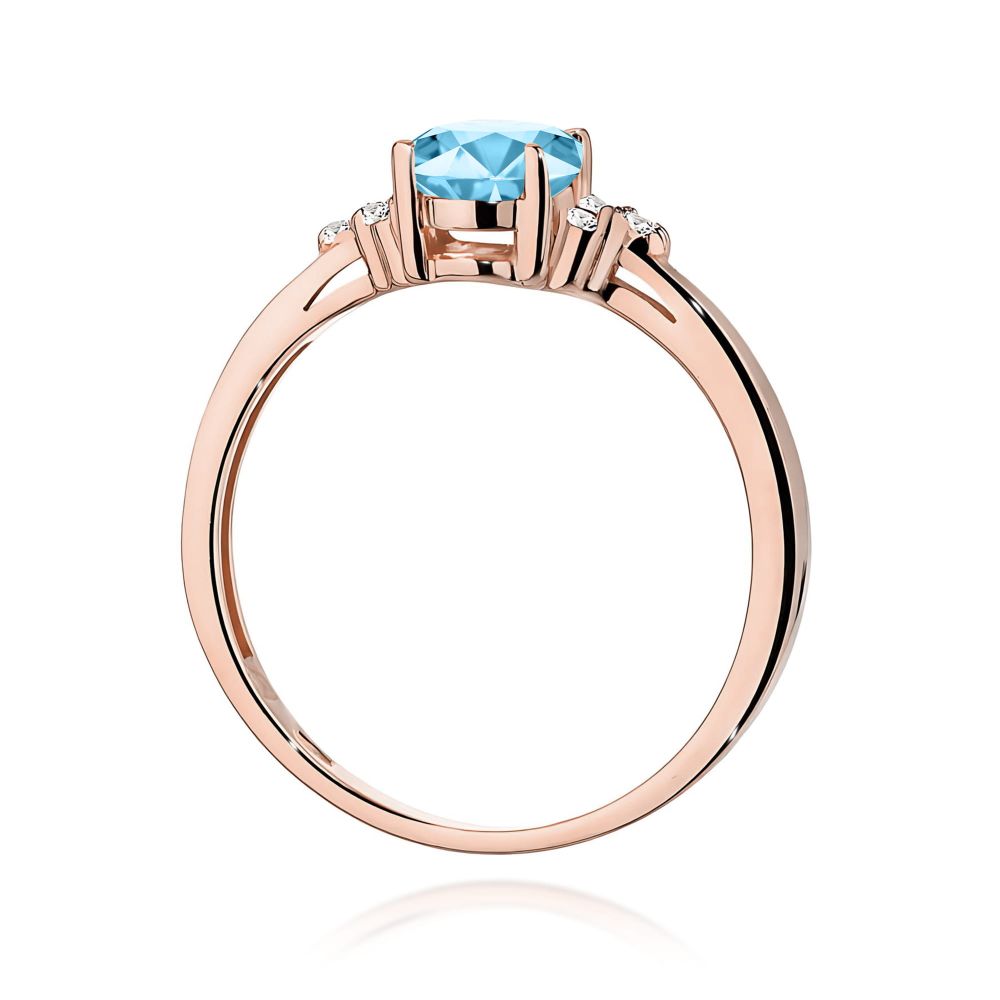 Pierścionek z topazem Swiss Blue 0,90 ct i brylantami, różowe złoto 585