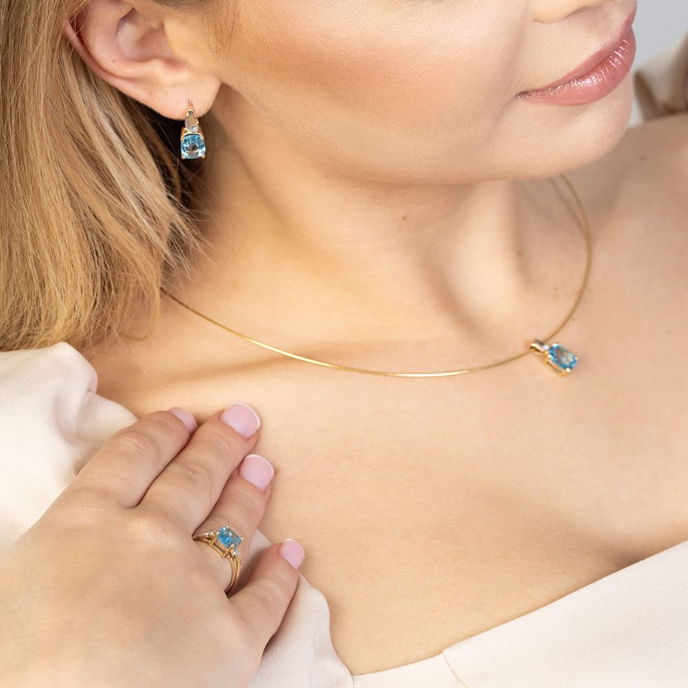 Pierścionek z topazem Swiss Blue 2,40 ct i brylantami, żółte złoto 585