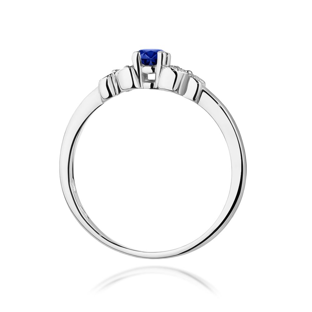 Pierścionek ze szafirem 0,15 ct i brylantami, białe złoto 585