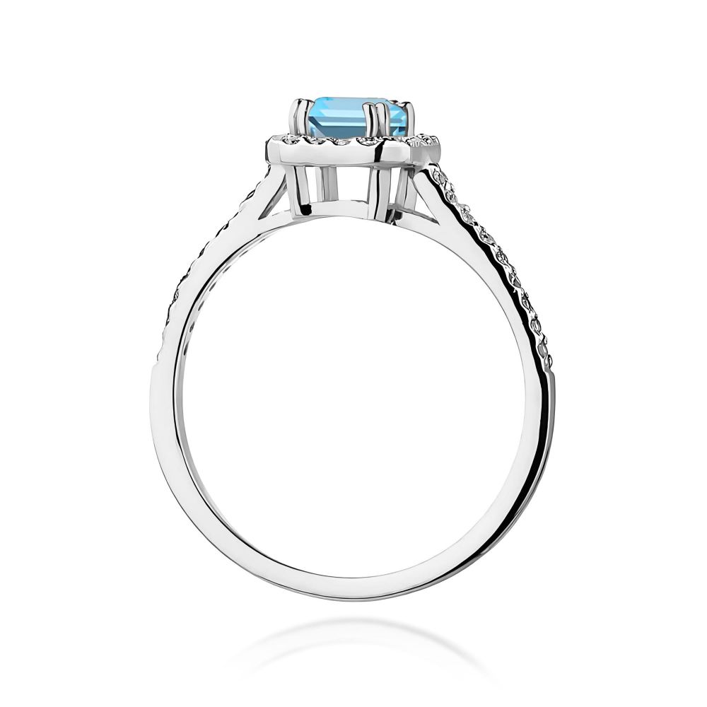 Pierścionek z topazem Swiss Blue 0,65 ct i brylantami, białe złoto 585