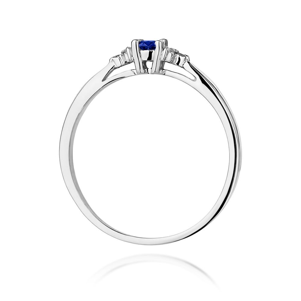 Pierścionek ze szafirem 0,15 ct i brylantami, białe złoto 585
