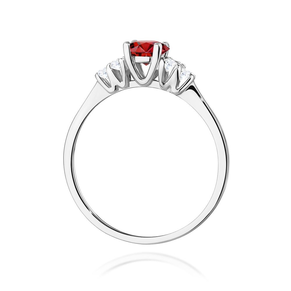 Pierścionek z granatem 0,60 ct i brylantami, białe złoto 585