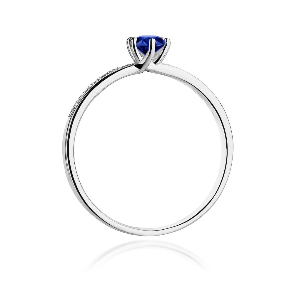 Pierścionek ze szafirem 0,15 ct i brylantami, białe złoto 585
