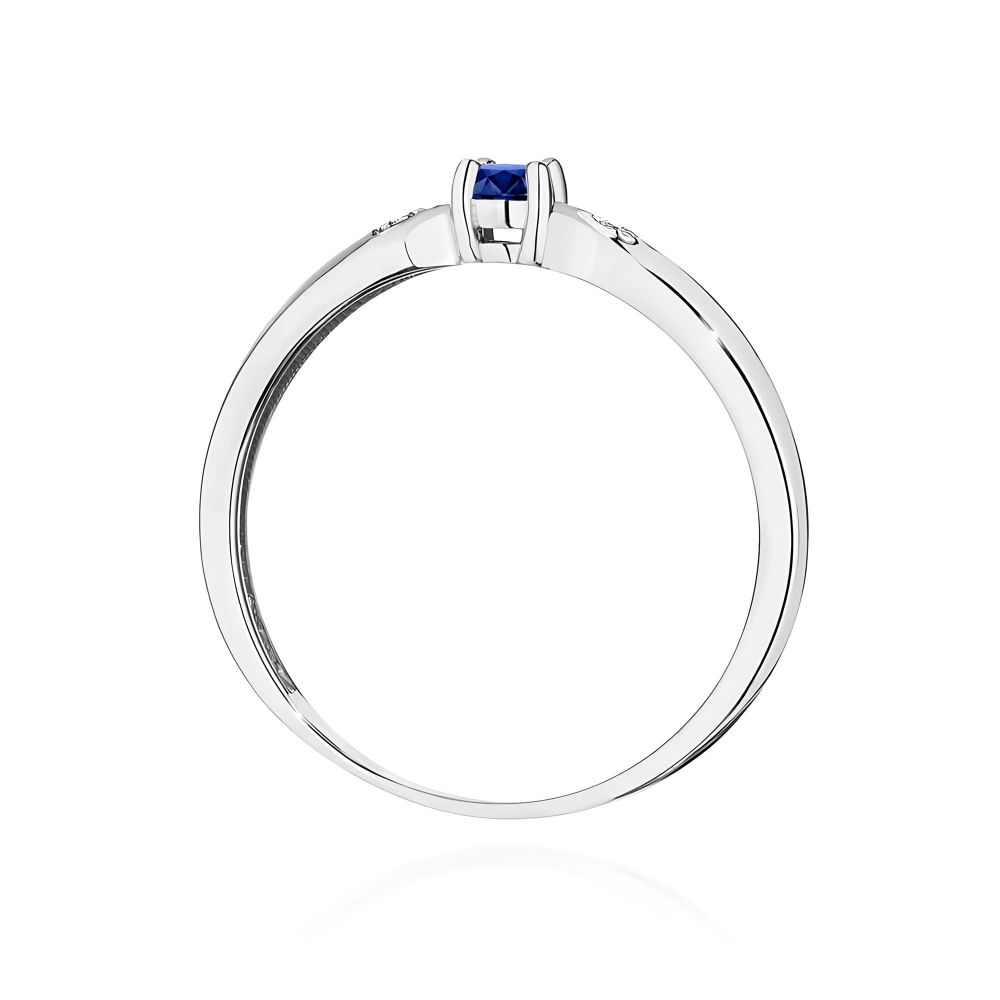 Pierścionek ze szafirem 0,15 ct i brylantami, białe złoto 585