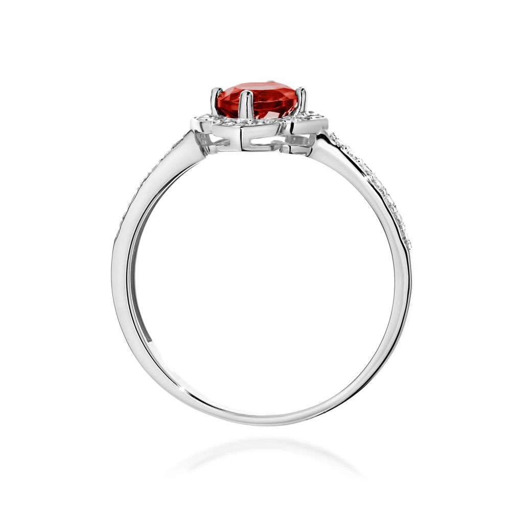 Pierścionek z granatem 0,60 ct i brylantami, białe złoto 585