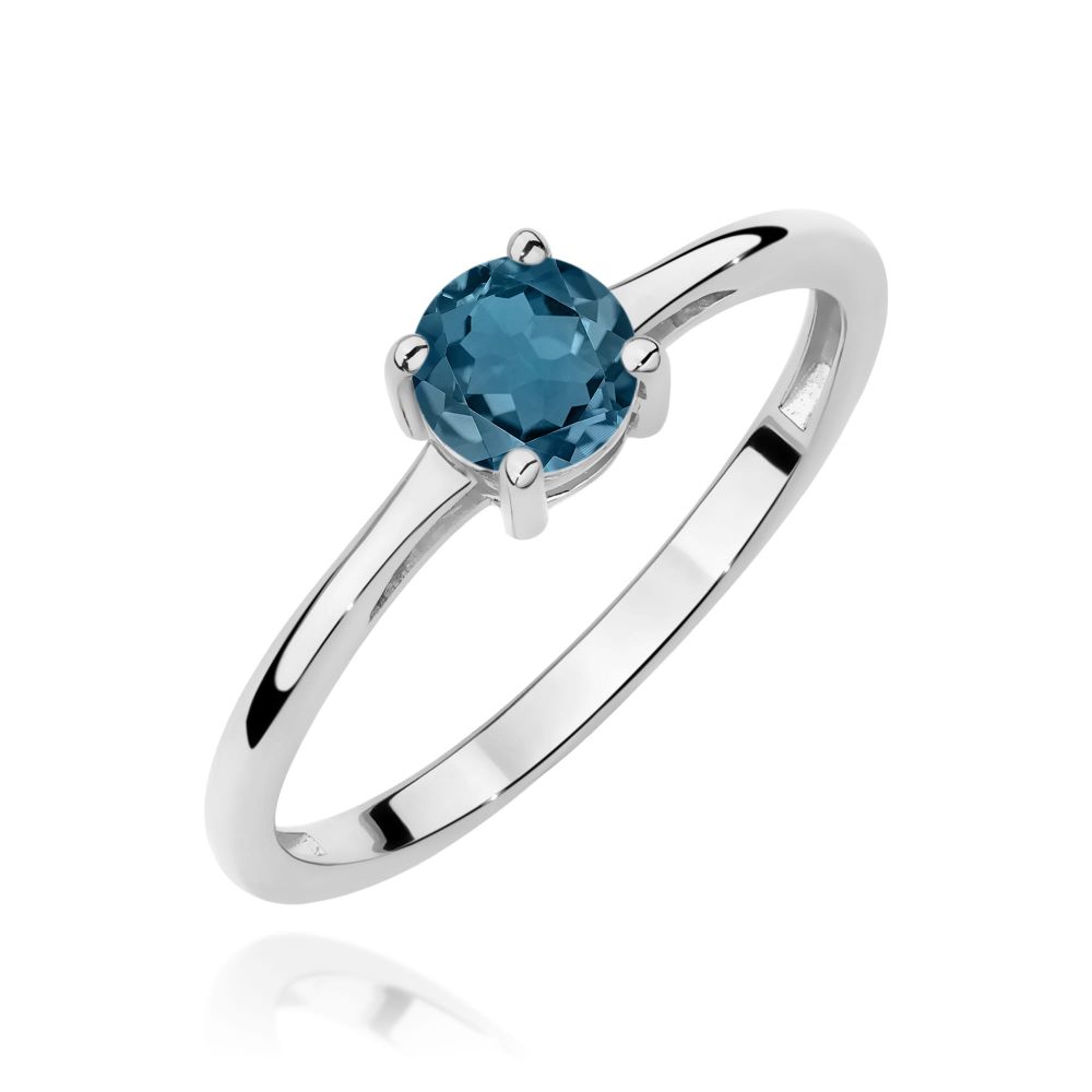 Pierścionek z topazem London Blue 0,50 ct, białe złoto 585