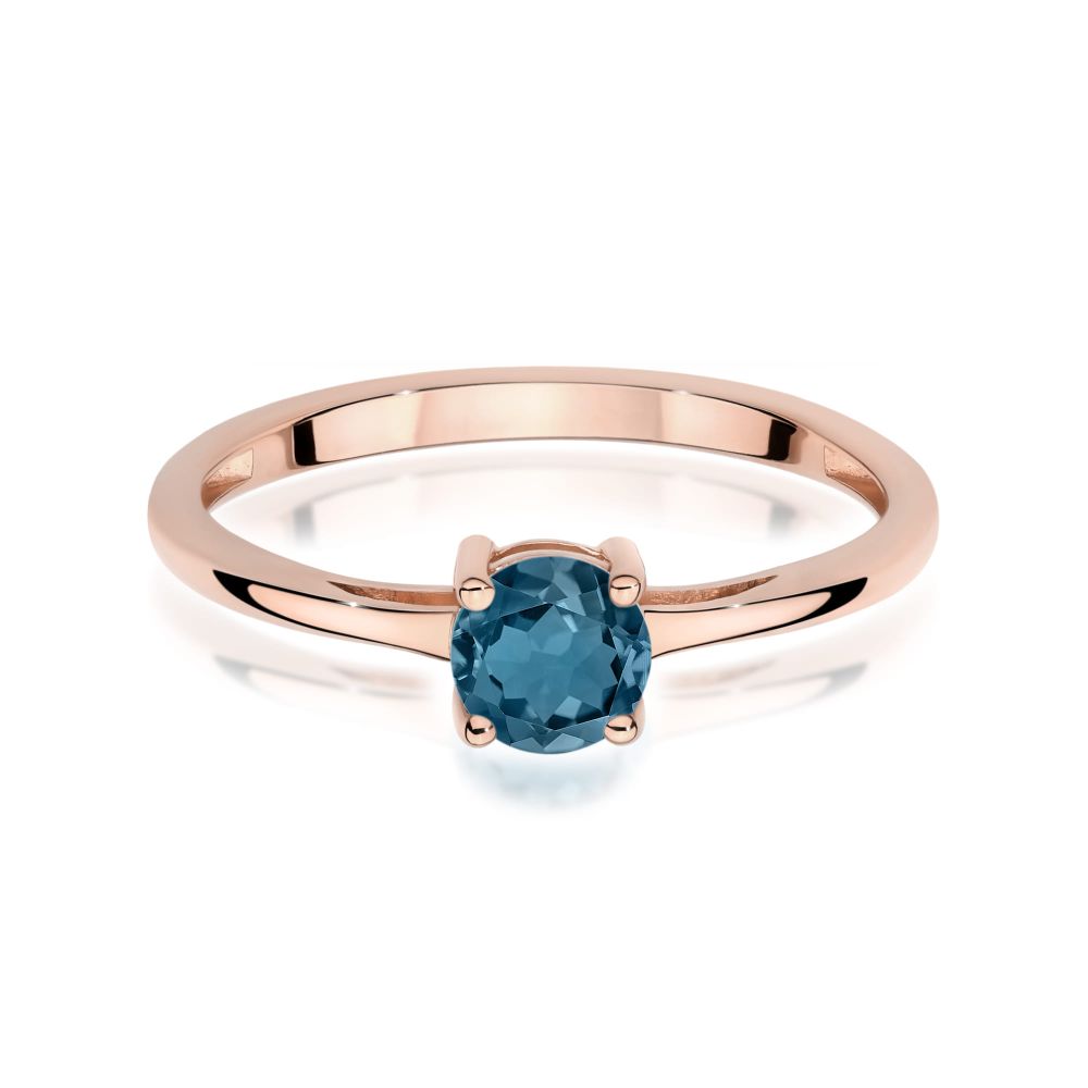 Pierścionek z topazem London Blue 0,50 ct, różowe złoto 585