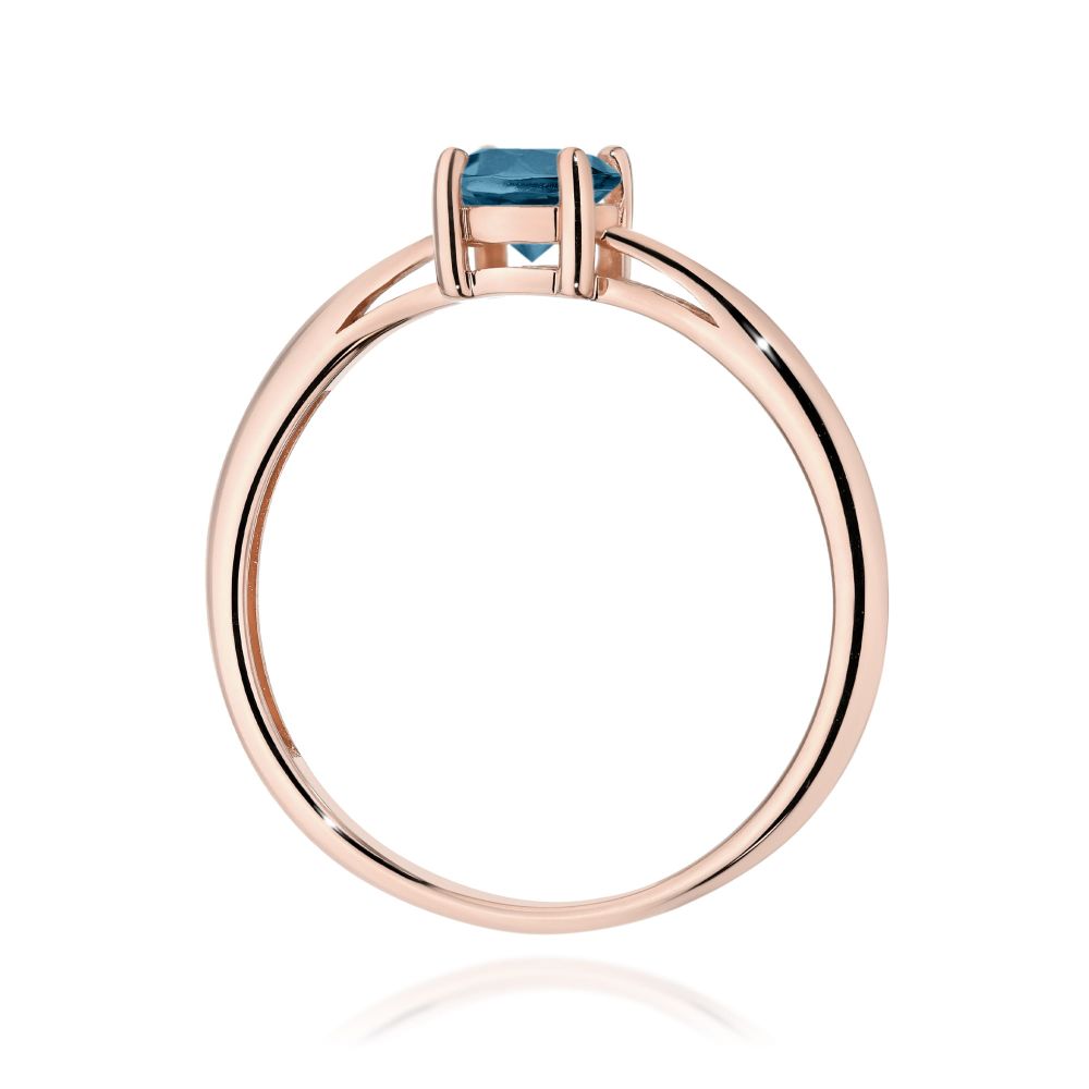 Pierścionek z topazem London Blue 0,50 ct, różowe złoto 585